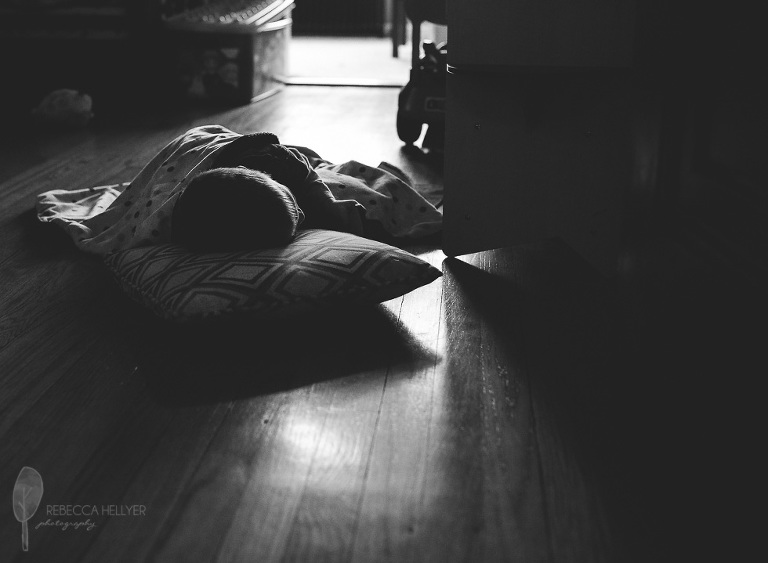 child resting on floor chicago photographer